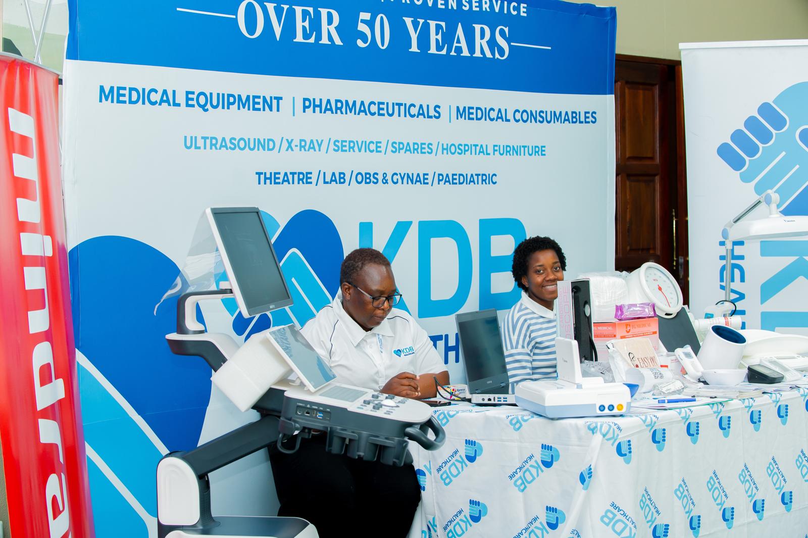 Exhibitor representatives at their stand during the congress