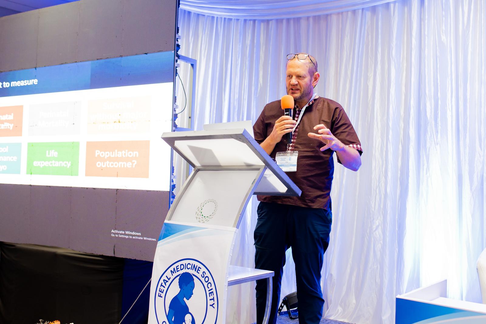 Keynote speaker presenting on perinatal outcome measures at the Annual Congress